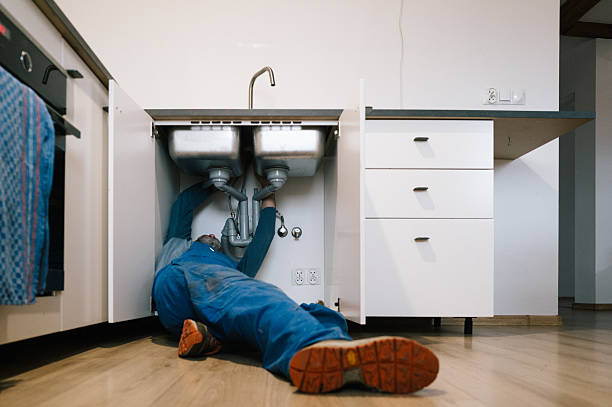 Professional Drain Cleaning technician working in Caledonia, MI